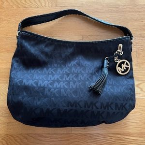 Michael Kors black hobo with tassel and gold MK